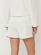 Color-blocked embroidered trim shorts